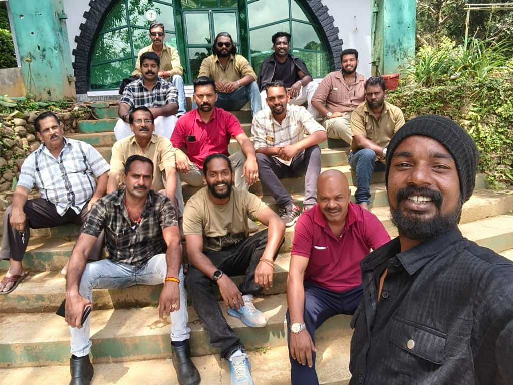 Thekkady Trips drivers, guides and guests seated on Gavi eco-centre steps