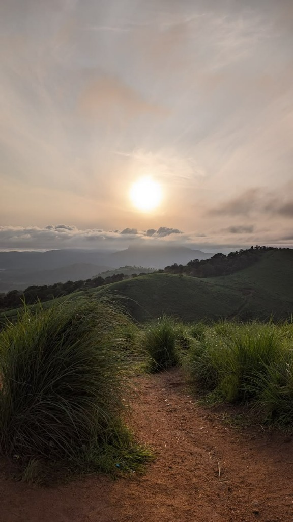 Sunrise over Wagamon Mountain Ridge and Thangal Para Trail